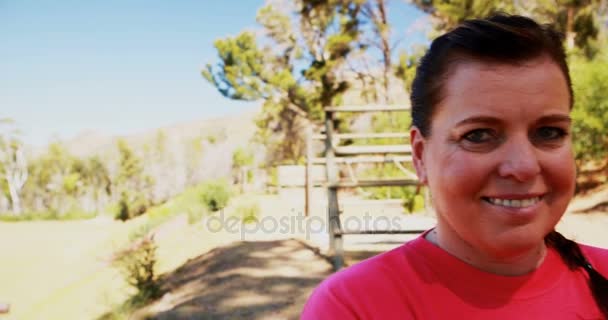 Woman standing in boot camp — Stock Video