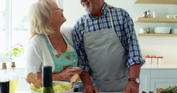 Smiling couple interacting while having a glass of wine — Stock Video