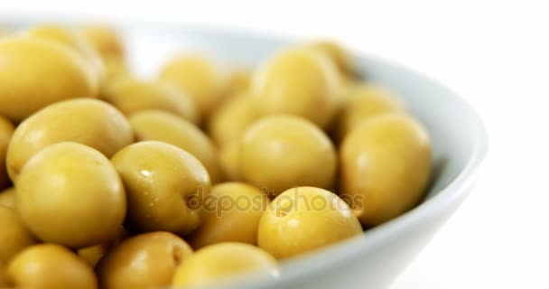 Close-up of marinated olives in bowl — Stock Video