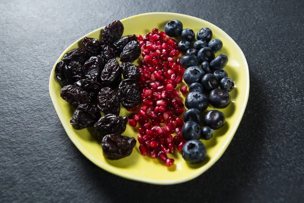 Various fruits in plate — Stock Photo, Image