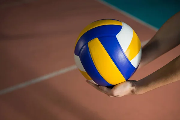 Cropped hands of player with volleyball — Stock Photo, Image