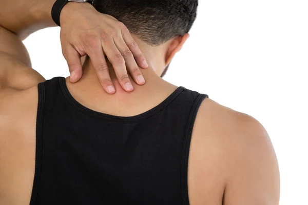 Rückansicht eines Mannes, der seinen Hals berührt — Stockfoto