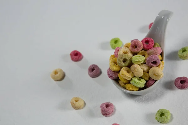 Froot loops in spoon — Stock Photo, Image