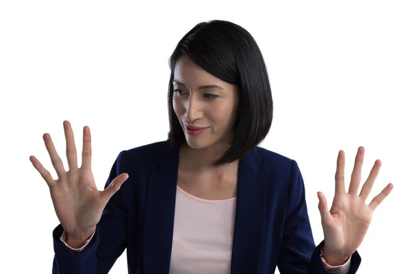 Businesswoman using invisible screen — Stock Photo, Image