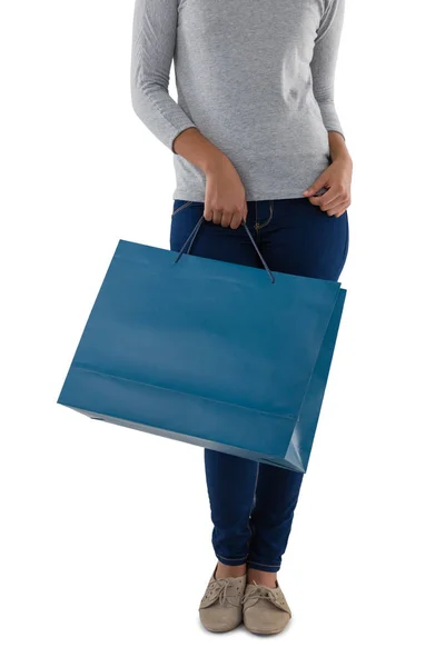 Frau mit blauer Einkaufstasche — Stockfoto