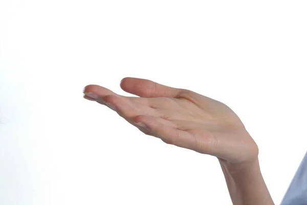 Mano de mujer fingiendo sostener un objeto invisible — Foto de Stock