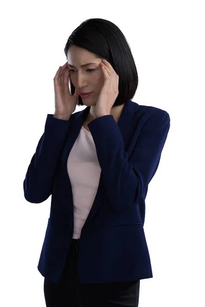 Affärskvinna som lider av huvudvärk — Stockfoto