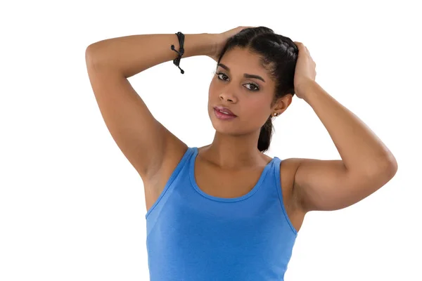 Young woman with hands in hair — Stock Photo, Image