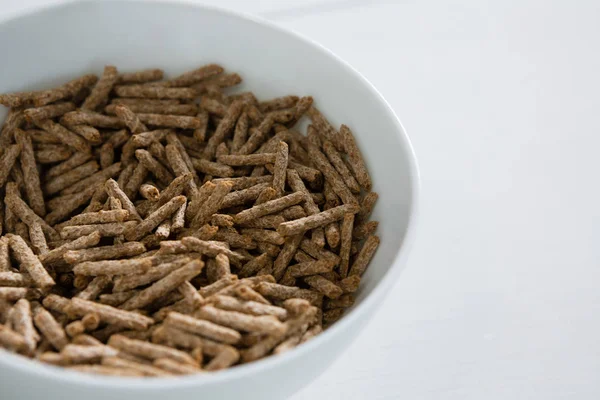 Palitos de salvado de cereales en un tazón —  Fotos de Stock