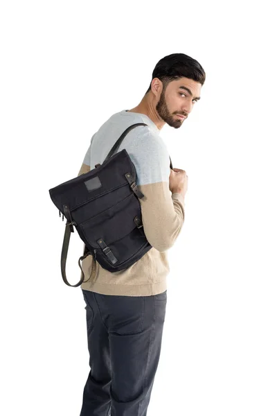 Bello uomo in posa con borsa — Foto Stock