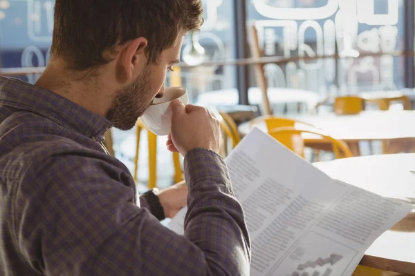 Businessman reading newspaper — Stock Photo, Image