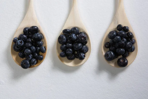 Blueberries arranged in a spoon — Stock Photo, Image
