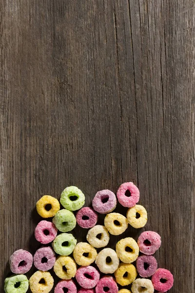 Froot loops arranged on wooden table — Stock Photo, Image