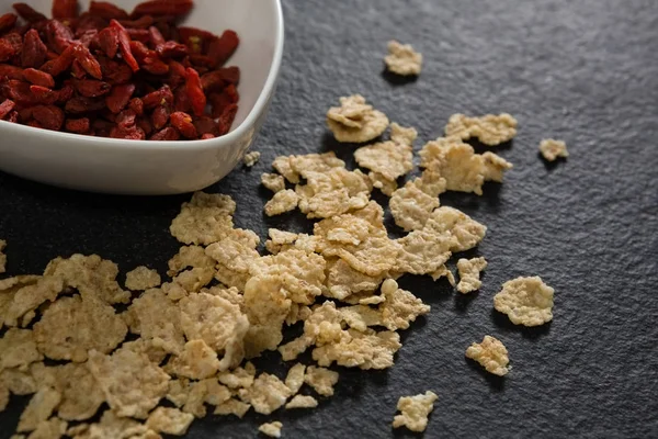 Bowl of dried fruits with corn flakes — Stock Photo, Image