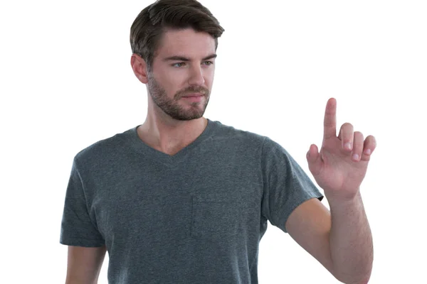 Man pretending to touch an invisible screen — Stock Photo, Image