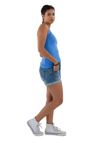 Side view full length portrait of young woman — Stock Photo, Image