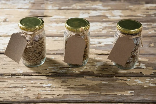 Três jarro com vários cereais de café da manhã — Fotografia de Stock