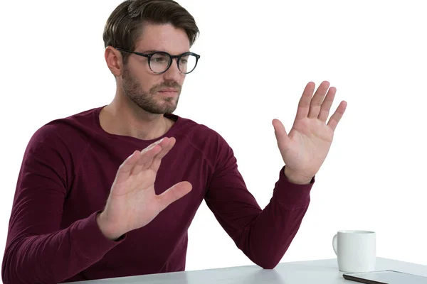 Man pretending to use an invisible screen — Stock Photo, Image