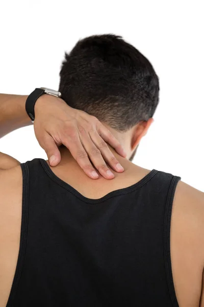 Zadní pohled člověka dotýká krku — Stock fotografie