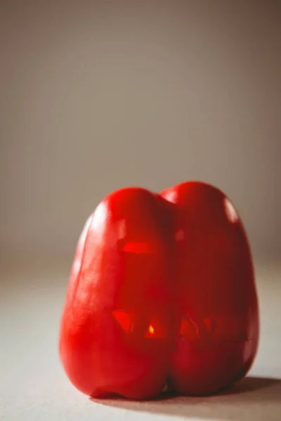 Carved red bell pepper over white background — Stock Photo, Image