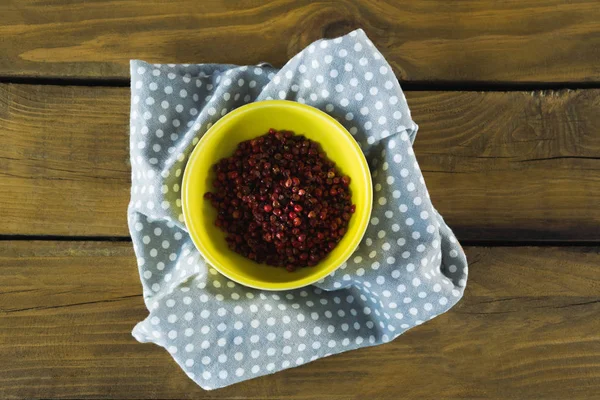 Pink peppercorn in bowl