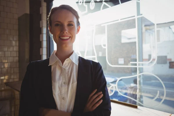 Portrait of confident owner in cafe — Stock Photo, Image