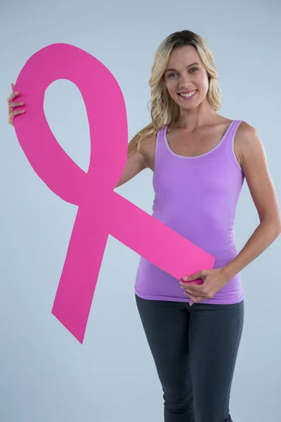 Female showing Breast Cancer Awareness ribbon — Stock Photo, Image