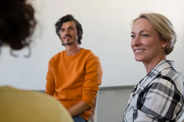 Close up of woman looking at friend — Stock Photo, Image