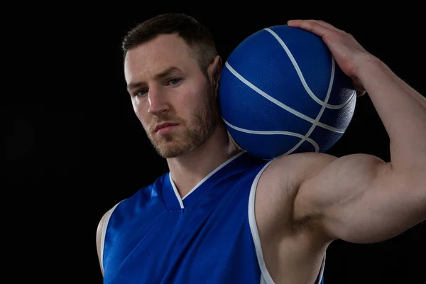 Confident player holding basketball — Stock Photo, Image