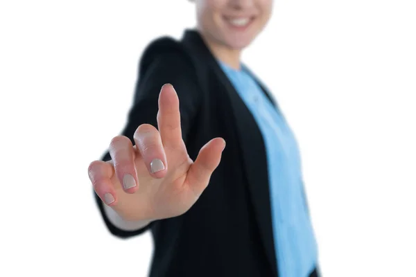 Businesswoman touching imaginary interface — Stock Photo, Image