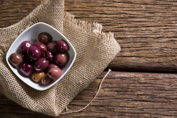 Marinated olives in bowl — Stock Photo, Image