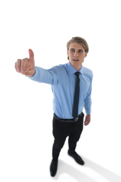 Businessman touching invisible screen — Stock Photo, Image