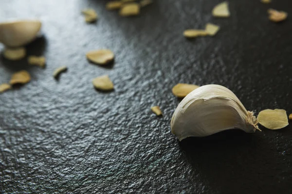 Close-up of garlic on black — Stock Photo, Image