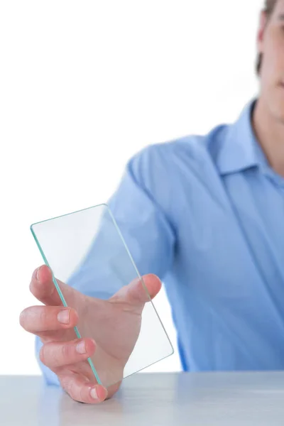 Businessman showing glass interface — Stock Photo, Image