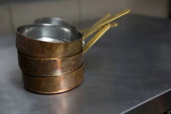 Close-up of stacked pot on shelf — Stock Photo, Image