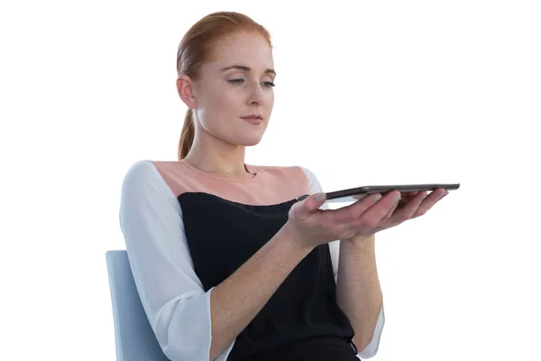 Businesswoman holding tablet — Stock Photo, Image