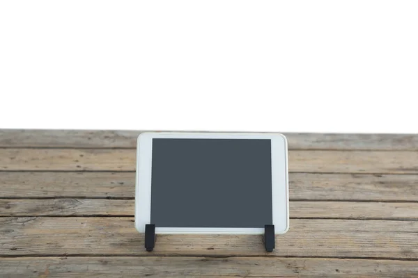 Υπολογιστή tablet με περίπτερο στο ξύλινο τραπέζι — Φωτογραφία Αρχείου