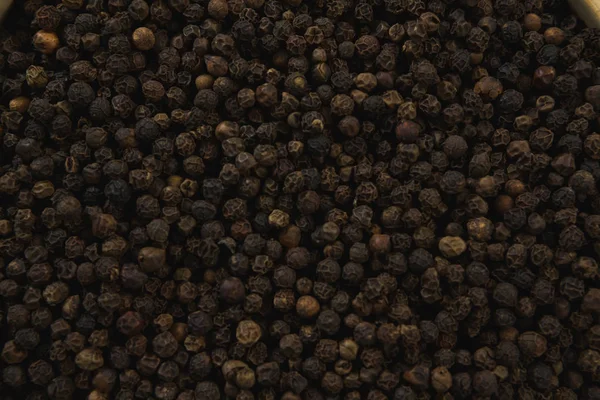Close-up de pimentas pretas — Fotografia de Stock