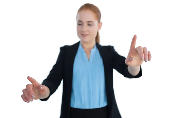 Businesswoman working on imaginary interface — Stock Photo, Image