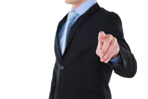 Businessman gesturing on invisible interface — Stock Photo, Image