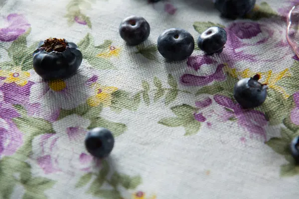 Close-up of blueberries on textile — Stock Photo, Image
