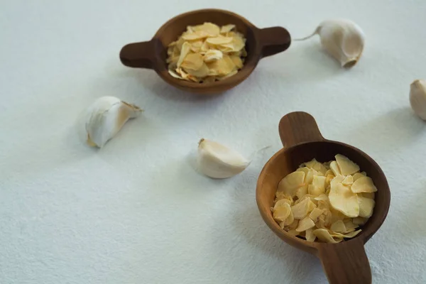 Spices in bowl with garlic — Stock Photo, Image