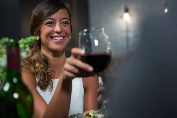 Beautiful woman having red wine — Stock Photo, Image