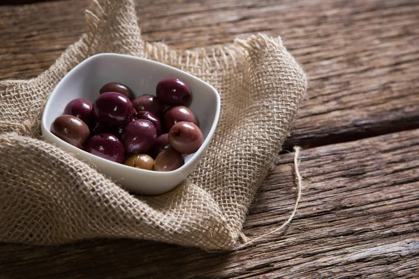 Marinated olives in bowl — Stock Photo, Image