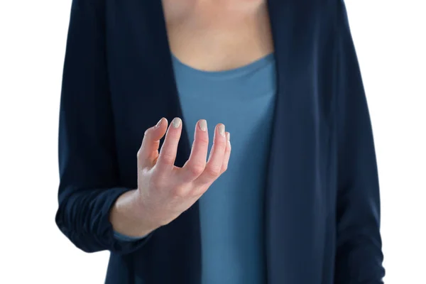 Businesswoman holding imaginary product — Stock Photo, Image