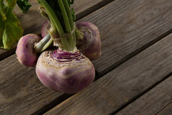 Turnip on wooden table — Stock Photo, Image