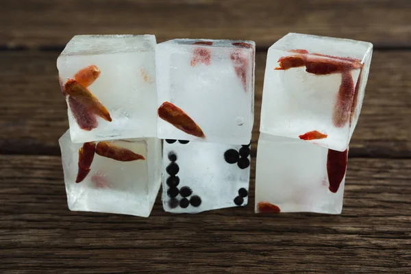 Flavored ice cubes with herbs — Stock Photo, Image