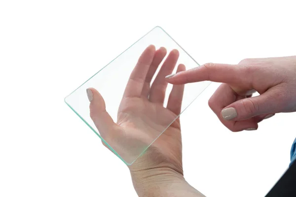 Cropped hand of businesswoman touching glass interface — Stock Photo, Image