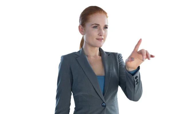Businesswoman using imaginary interface — Stock Photo, Image