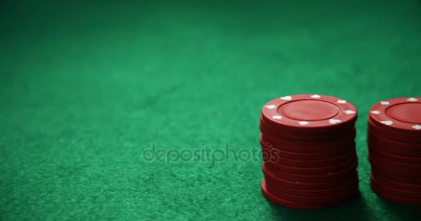 Playing cards and casino chips on poker table — Stock Video